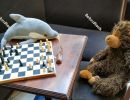 Dolphin and monkey - Instead of guests, plush figures sit at tab