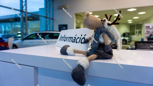 Christmas reindeer figurine in the car showroom Christmas reindeer figurine in the car showroom