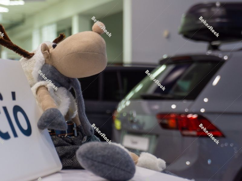 Christmas reindeer figurine in the car showroom