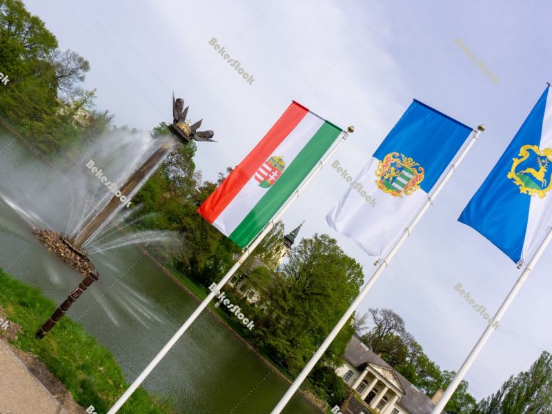 The flag of Hungary, the flag of Békés county and the flag of  The flag of Hungary, the flag of Békés county and the flag of