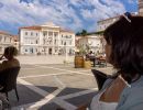 Guests are sitting on the terrace of the cafe, Piran, Obalno-kra