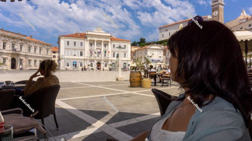 Guests are sitting on the terrace of the cafe, Piran, Obalno-kra Guests are sitting on the terrace of the cafe, Piran, Obalno-kra