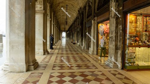 Deserted arcade on St. Mark's Square in Venice during the corona Deserted arcade on St. Mark's Square in Venice during the corona