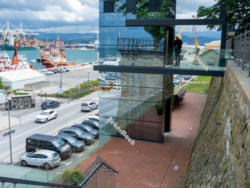 Panoramic glass elevator in the port of Koper. Koper (`Capodistr Panoramic glass elevator in the port of Koper. Koper (`Capodistr