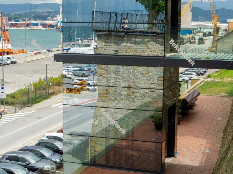Panoramic glass elevator in the port of Koper. Koper (`Capodistr Panoramic glass elevator in the port of Koper. Koper (`Capodistr