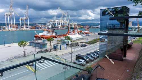 Panoramic glass elevator in the port of Koper. Koper (`Capodistr Panoramic glass elevator in the port of Koper. Koper (`Capodistr