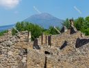 Ancient ruins of Pompeii, with Mount Vesuvius (`Vesuvio`) in the
