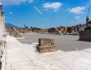 Civil Forum in Pompeii. The blue sky and Mount Vesuvius provide 