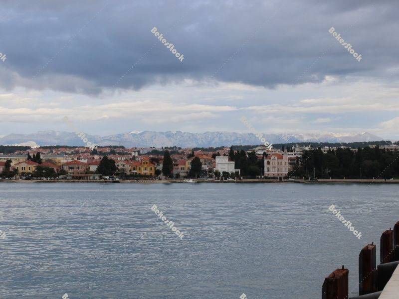 Zadar as seen from the sea with mountains in background, December 2019 Zadar as seen from the sea with mountains in background, December 2019
