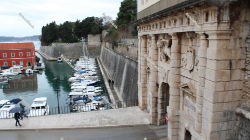 The Land Gate, Lion of Venice, background of the small port, Zadar, December 2019 The Land Gate, Lion of Venice, background of the small port, Zadar, December 2019