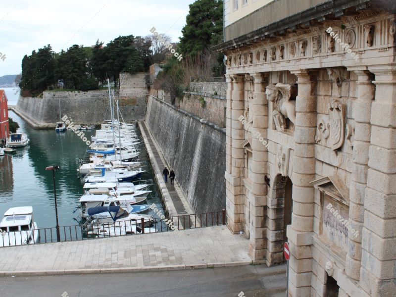 The Land Gate, Lion of Venice, background of the small port, Zadar, December 2019 The Land Gate, Lion of Venice, background of the small port, Zadar, December 2019
